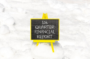 1st quarter financial report symbol. Concept words 1st quarter financial report on beautiful black blackboard. Beautiful snow background. Business 1st quarter financial report concept. Copy space.