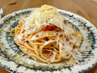 Homemade Pasta with Neapolitan Sauce at dinner table