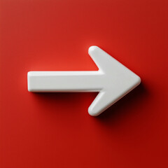 White directional arrow isolated on a red background