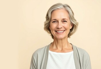 Fototapeta premium Half-length portrait of a middle-aged woman with a warm smile