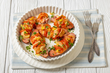 hot sausages baked with cheese, tomato, mustard
