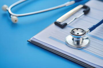 Close-up of a health report card showing elevated cholesterol, glucose, and BMI as risk factors, Health report card with elevated risk factors, Detailed and informative