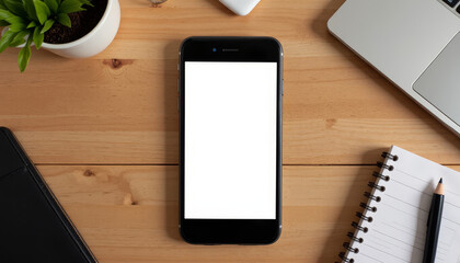 Creating a productive workspace with technology and nature on a wooden desk