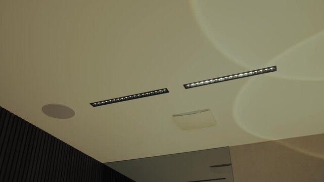 Discover the modern ceiling design that combines lighting and audio for a unique experience