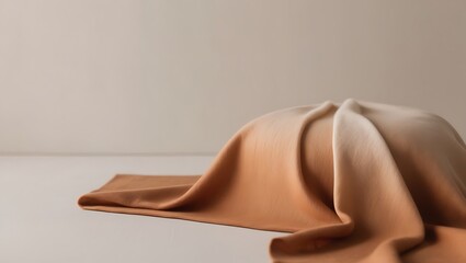 Draped ombre fabric forms a soft gentle hill