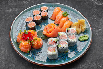 Various sushi with salmon, wasabi and ginger