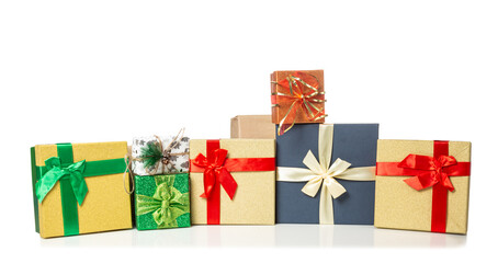 Fototapeta premium Colorful stacked gift boxes for New Year or Christmas isolated on white background