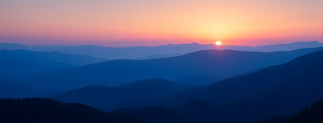 Fototapeta premium Stunning sunrise over serene mountain ranges with vibrant sky colors