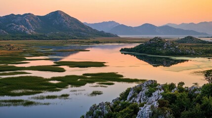 Lake skadar national park in montenegro offers stunning views of the lake, mountains, and islands reflecting the warm sunset light during golden hour