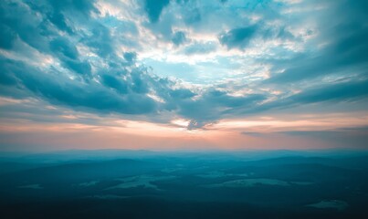 Obraz premium Watercolor painting of the sky softly textured on wet white paper background, abstract blue watercolor illustration banner, wallpaper