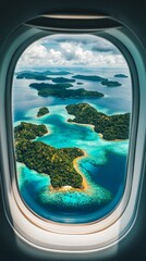 Fototapeta premium Aerial View of Tropical Islands from Airplane Window
