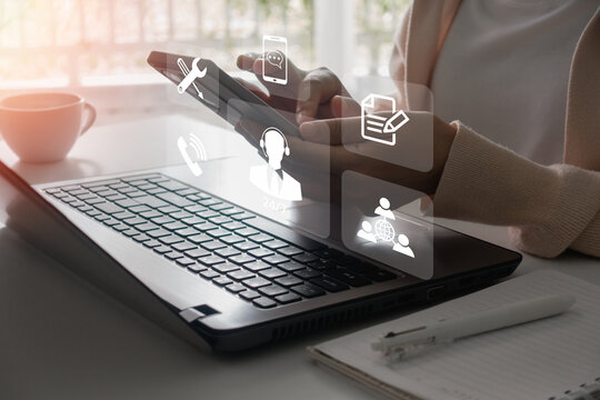 IT support, Technical support customer service concept. Woman hand using smartphone with VR screen support customer icon, Technology internet concept, call center and customer service help 24 hrs.