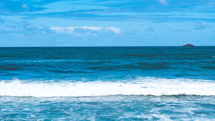 Beautiful ocean sea scenes clear day calm water blue sky Otago peninsula Dunedin New Zealand boats jetty dingy 