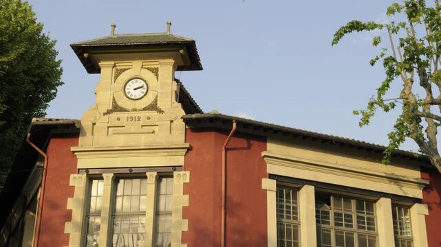 Clock facade at Ecole Nationale Superieure d'Arts et Metiers in Aix-en-Provence showcases historical architecture