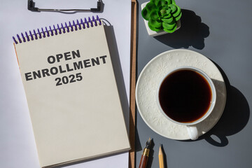 A coloured wooden block with text OPEN ENROLLMENT on it.