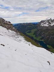 Swiss alps mountains with snow during a cloudy autumn afternoon