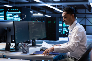 Data center IT expert developing strategies and procedures to ensure business continuity in case of...
