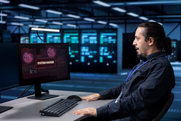 Engineer in server hub frightened by hacker passing company firewall and stealing sensitive user...