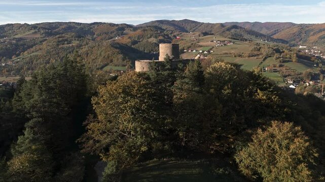 aerial view of rytro castle in poland at dawn in autumn
