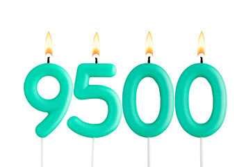 Candles forming the number 9500 - white background