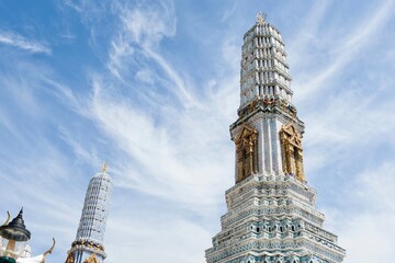 Phra Mondop Yot Prang, an ornately decorated tower at Wat Phra Kaew (the Temple of the Emerald Buddha) inside the Grand Palace - Bangkok, Thailand