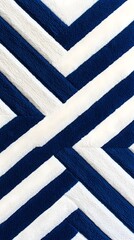 Fototapeta premium Angular blue and white chevron pattern, featuring bold lines and sleek geometric shapes, arranged in a rhythmic, repetitive design