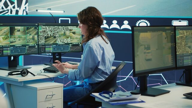 Monitoring room operator looking for routes on surveillance footage and gps satellite map, guiding courier to avoid traffic. Woman agency employee operating with CCTV system. Camera A.