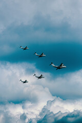 Military airplanes flying in V formation

