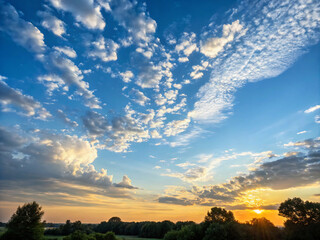 sunset over the field. sunset, sky, clouds, sun, cloud, landscape, nature, orange, evening, sunrise, blue, light, red, trees, summer, beautiful, silhouette, dusk, yellow, view, dawn, dark