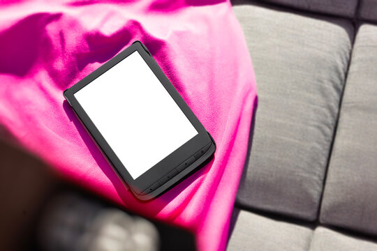 Top view of a e-book with blank screen, Spending free time