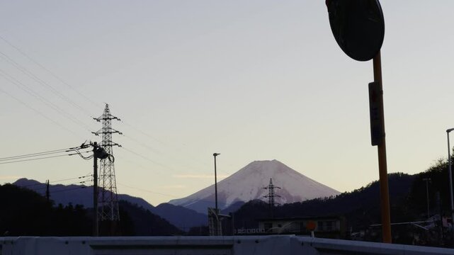 Mount Fuji from Otsuki: Iconic Japanese Landscape
The majestic Mount Fuji rises above the Otsuki horizon, surrounded by serene nature.