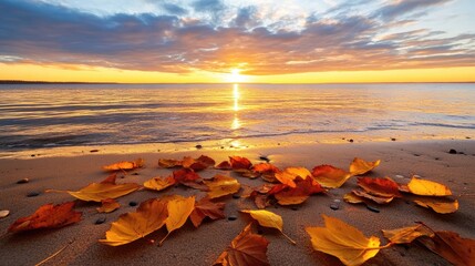 Obraz premium Tranquil Sunset Over Calm Water with Colorful Autumn Leaves on Sandy Shoreline During Peaceful Evening