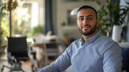 Corporate wellness portrait, middle-eastern appearance male, business casual outfit, adaptive workspace setting, medical mobility devices, comfortable home office, natural illumination, architectural