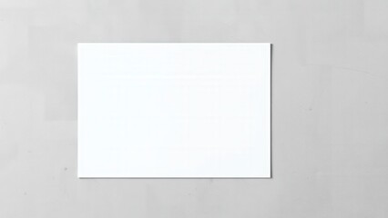 Blank White Paper on Gray Background: Ideal for Mockups, Presentations, and Design Projects