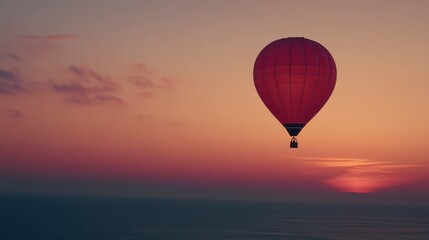 Fototapeta premium Serene Sunset Hot Air Balloon Ride Over Ocean