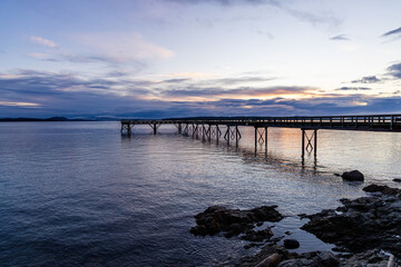 Fototapeta premium Serene Sunrise Over The Pier in Sidney, Vancouver Island, British Columbia