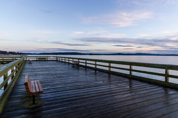 Fototapeta premium Serene Sunrise Over Sidney Pier on Vancouver Island Coastal View