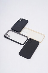 Black case and transparent case for smartphone isolated on white background. High resolution photo.