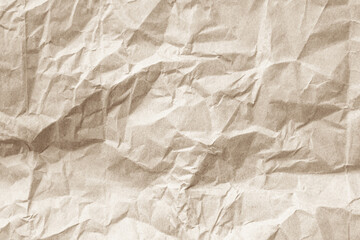 Fototapeta premium Crumpled brown paper texture background for design with copy space for text or image.