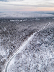 Winter road among the taiga