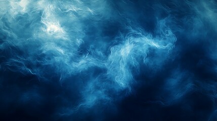 Obraz premium Abstract swirling blue smoke clouds, dark moody background.