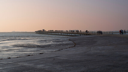 Footbridge at Mont Saint-Michel in France against the light