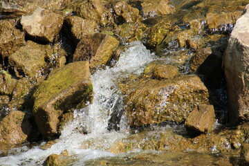 water flowing over rocks