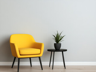 Bright yellow chair alongside a small black table with a potted plant in a minimalist interior