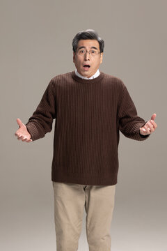 Senior Chinese man with a surprise look on his face