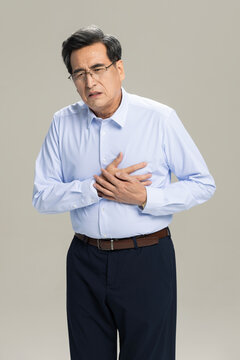 Male entrepreneur having a heart attack