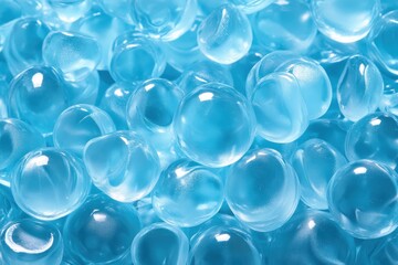 Close up of pale blue gel spheres Watery polymer backdrop Clear liquid See through texture