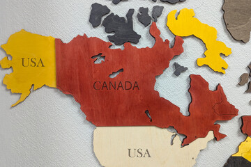 North America continent on a wooden world map on a wall. USA, Canada