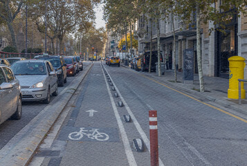 Busy street with cars and a bike lane
