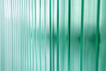 Obraz premium Interior partition made of green polycarbonate with lighting textured turquoise frosted glass clear corrugated glass